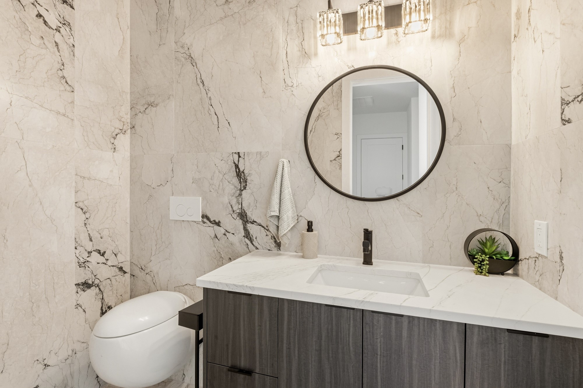 2300 Bluebonnet Lane Austin, TX 78704 - Photo 27 of 40 a bathroom with a toilet sink and mirror