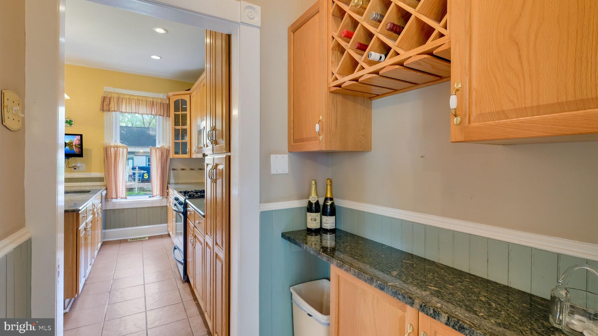 130 Woodland Road Wyncote, PA 19095 - Photo 29 of 37 WINE rack with convenient staging area