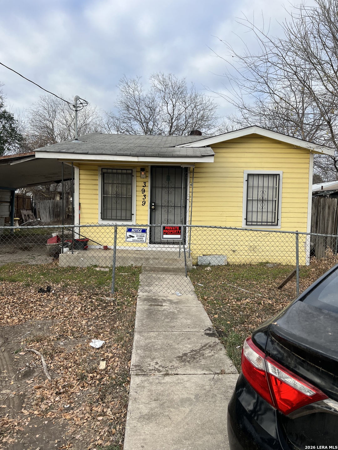 3939 Culebra Road San Antonio, TX 78228 - Photo 2 of 8 a front view of a house with a yard