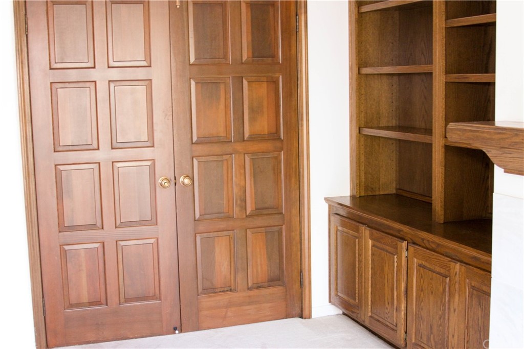 2 Cambridge Manhattan Beach, CA 90266 - Photo 16 of 33 a kitchen with a refrigerator and cabinets