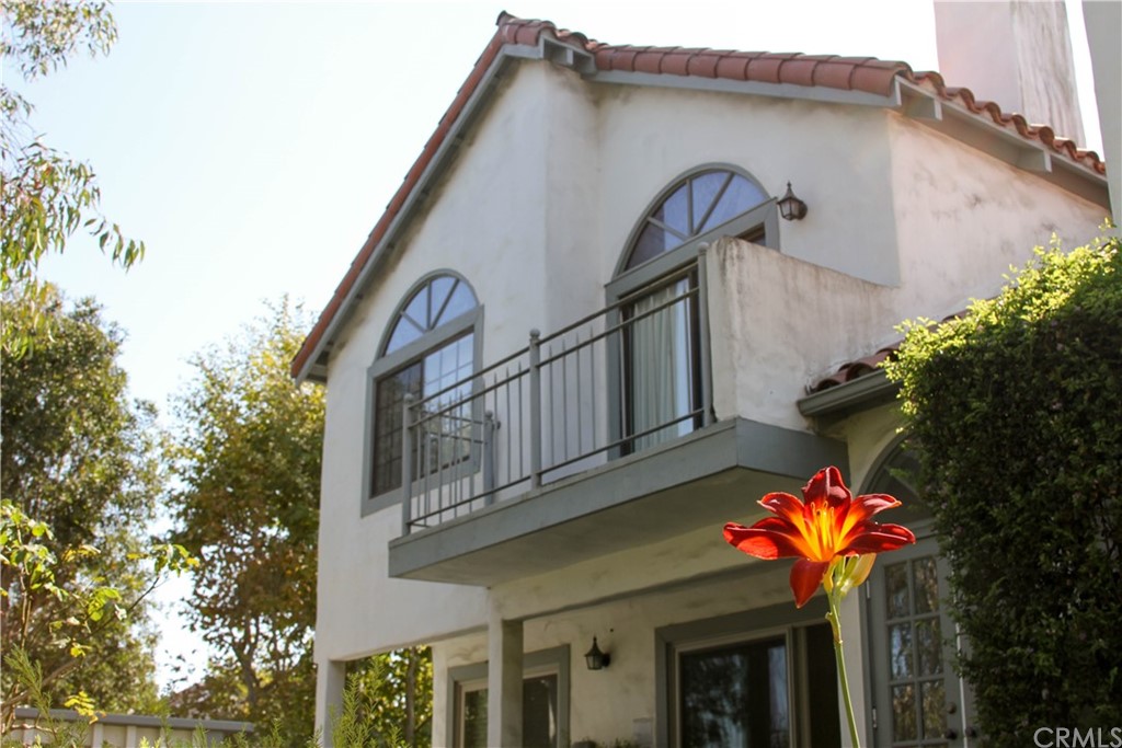 2 Cambridge Manhattan Beach, CA 90266 - Photo 30 of 33 a front view of a house with a yard and garage