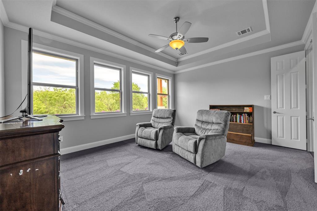 1060 Waters Edge Court Oak Point, TX 75068 - Photo 9 of 40 a living room with furniture and a window