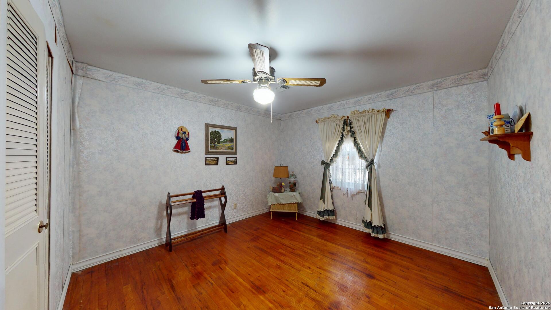 607 Exchange Schertz, TX 78154 - Photo 16 of 34 a view of empty room with wooden floor