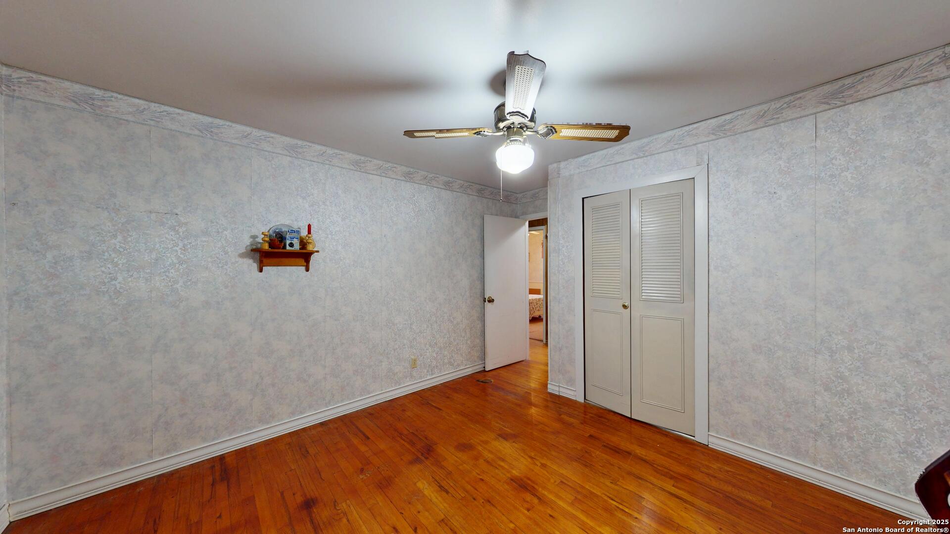 607 Exchange Schertz, TX 78154 - Photo 18 of 34 a view of empty room with wooden floor