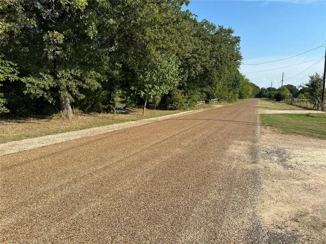 a view of a field with an outdoor space