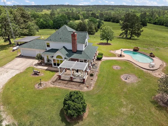 swimming pool view with a outdoor space