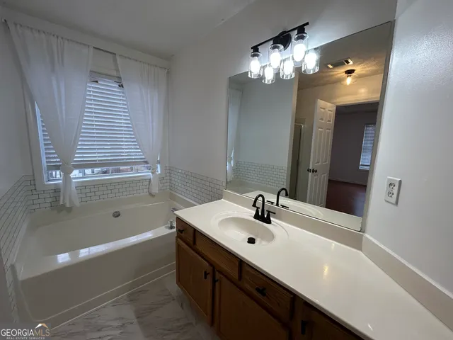 a bathroom with a bathtub