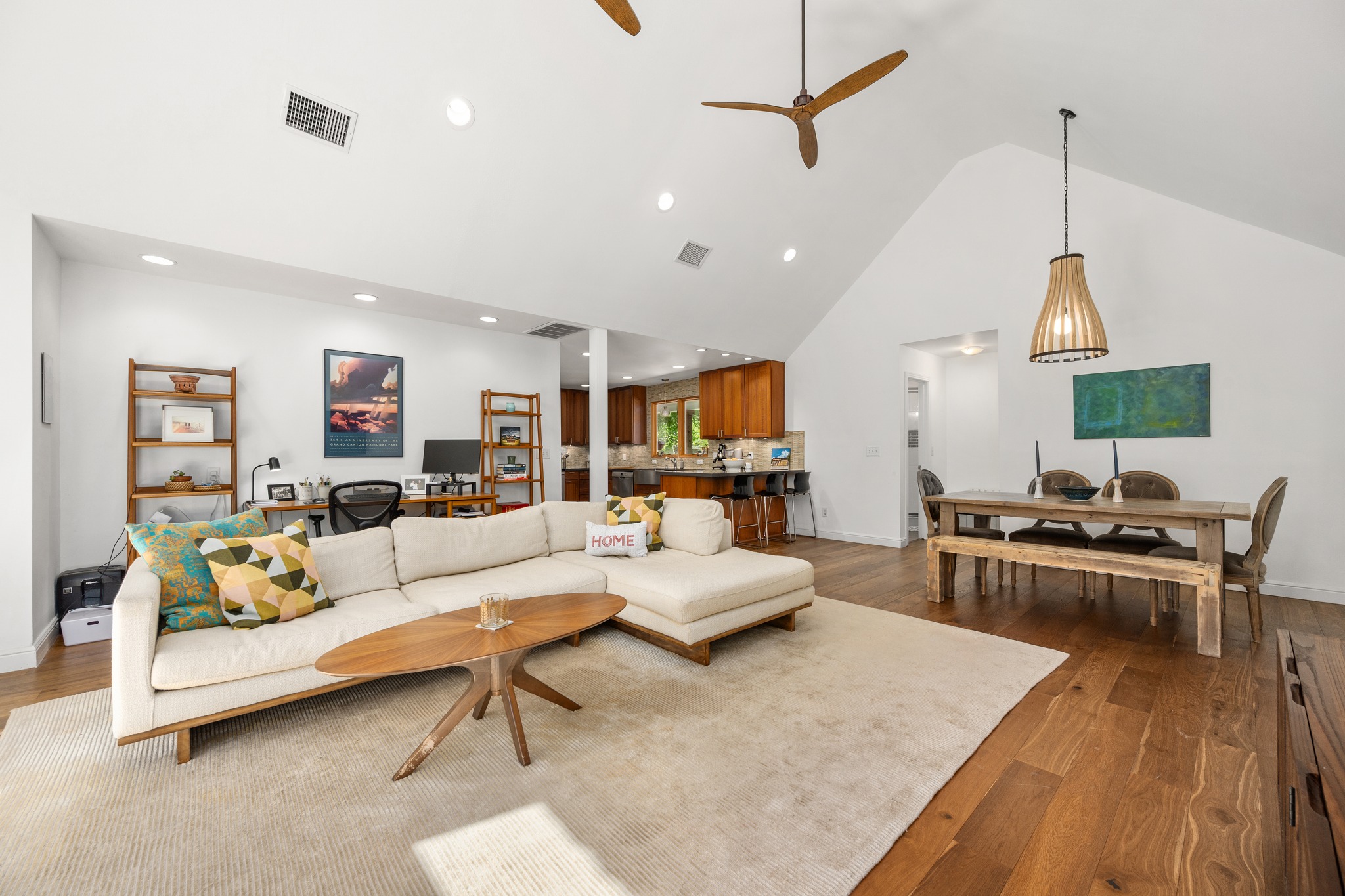 6103 Bull Creek Road Austin, TX 78757 - Photo 15 of 29 Living area featuring a high ceiling, ceiling fan, dark wood-type flooring, and recessed lighting
