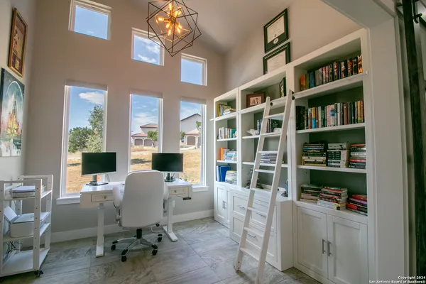 a workspace with a bookshelf