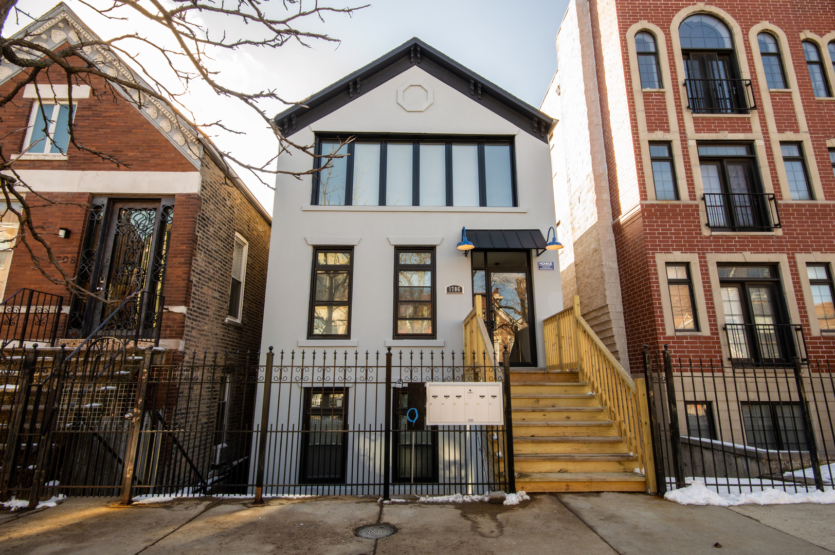 1706 South Carpenter Street, Unit 1R Chicago, IL 60608 - Photo 1 of 8 front view of a brick house with a door