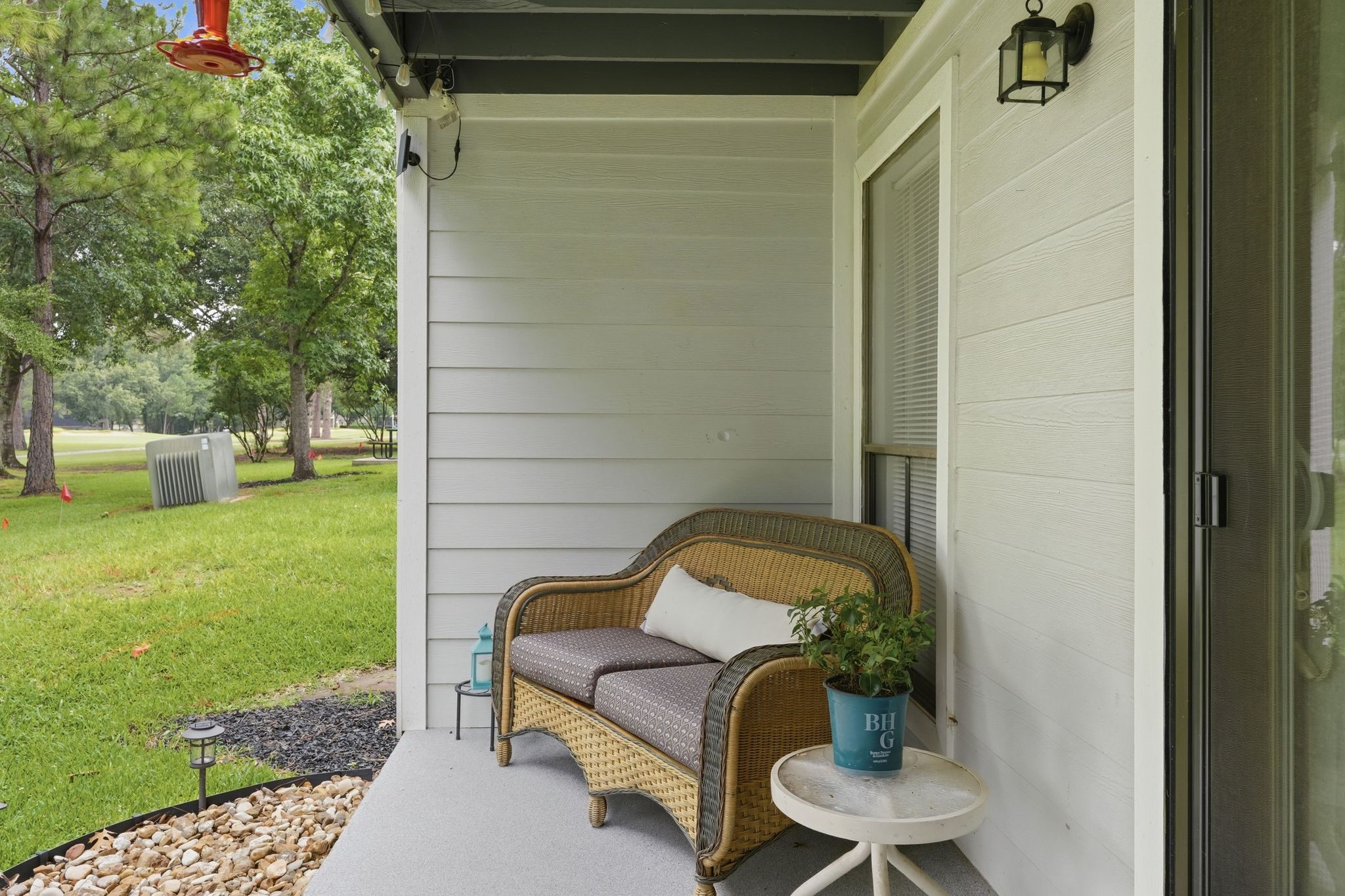 13151 Walden Road, Unit 131 Montgomery, TX 77356 - Photo 16 of 35 Private covered patio offering a peaceful place to relax outdoors.