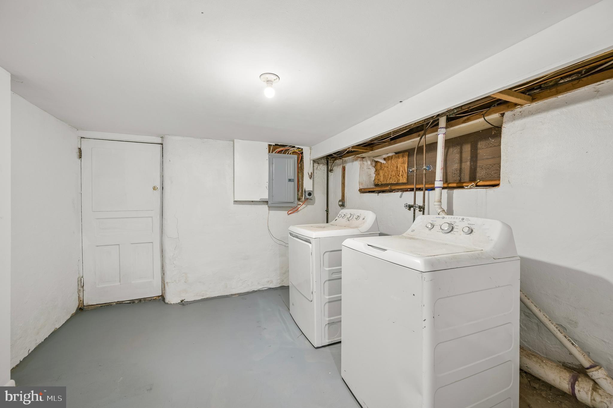 5625 Willows Avenue Philadelphia, PA 19143 - Photo 14 of 15 a utility room with dryer and washer