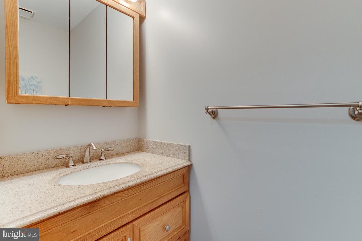 8032 Pine Ridge Road Pasadena, MD 21122 - Photo 23 of 54 Powder Room