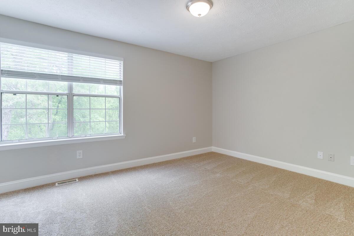 8032 Pine Ridge Road Pasadena, MD 21122 - Photo 25 of 54 Primary Bedrom