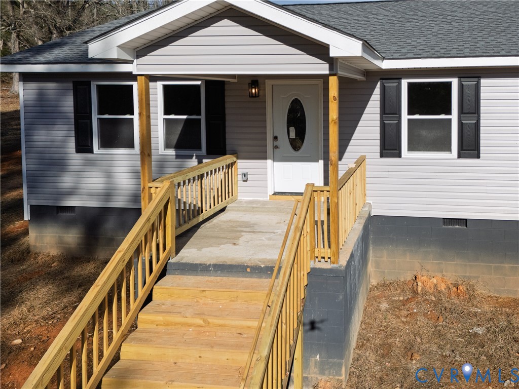 569 Gaulding Rd Hill La Crosse, VA 23950 - Photo 24 of 24 a view of a house with wooden stairs