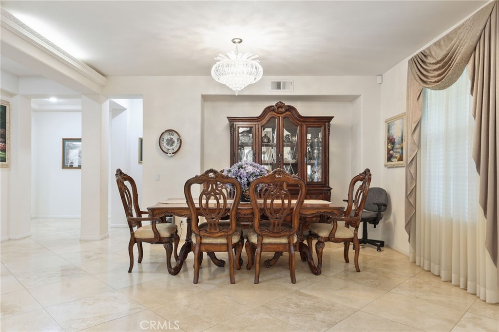12830 Wildflower Lane Riverside, CA 92503 - Photo 11 of 34 a dining room with furniture and window