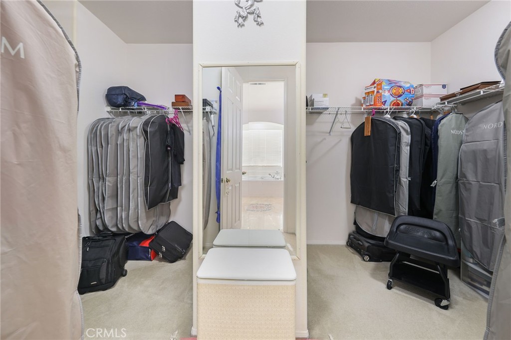 12830 Wildflower Lane Riverside, CA 92503 - Photo 27 of 34 a view of a walk in closet