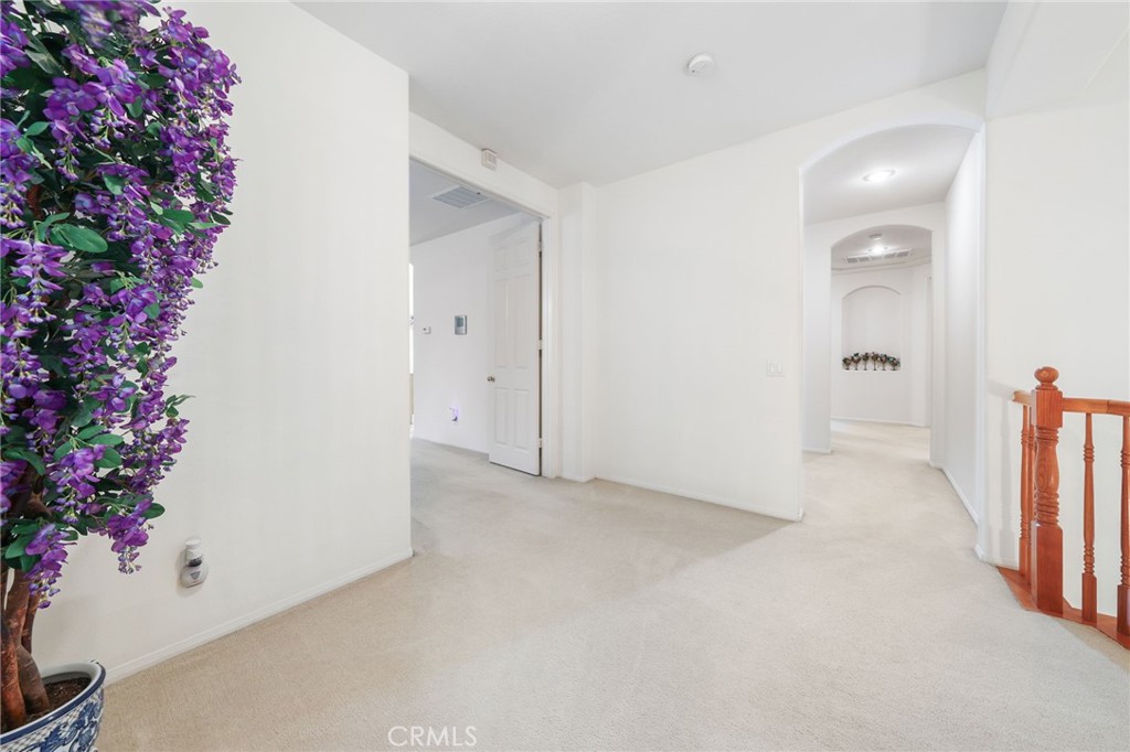 12830 Wildflower Lane Riverside, CA 92503 - Photo 31 of 34 a view of a hallway