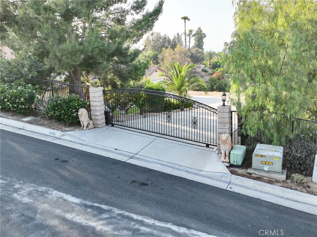 12830 Wildflower Lane Riverside, CA 92503 - Photo 4 of 34 a view of a bench in a road