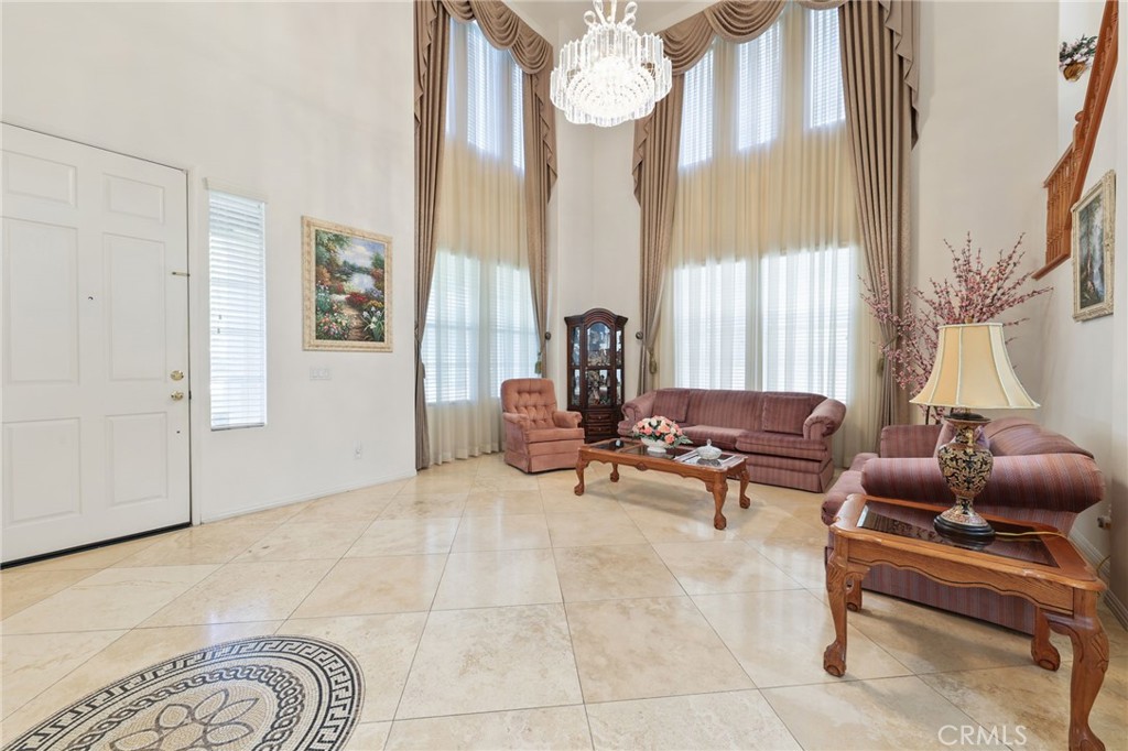 12830 Wildflower Lane Riverside, CA 92503 - Photo 8 of 34 a living room with furniture and a large window