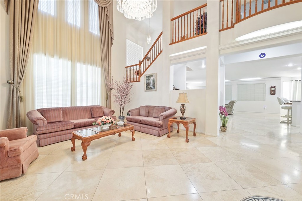 12830 Wildflower Lane Riverside, CA 92503 - Photo 9 of 34 a living room with furniture and a large window