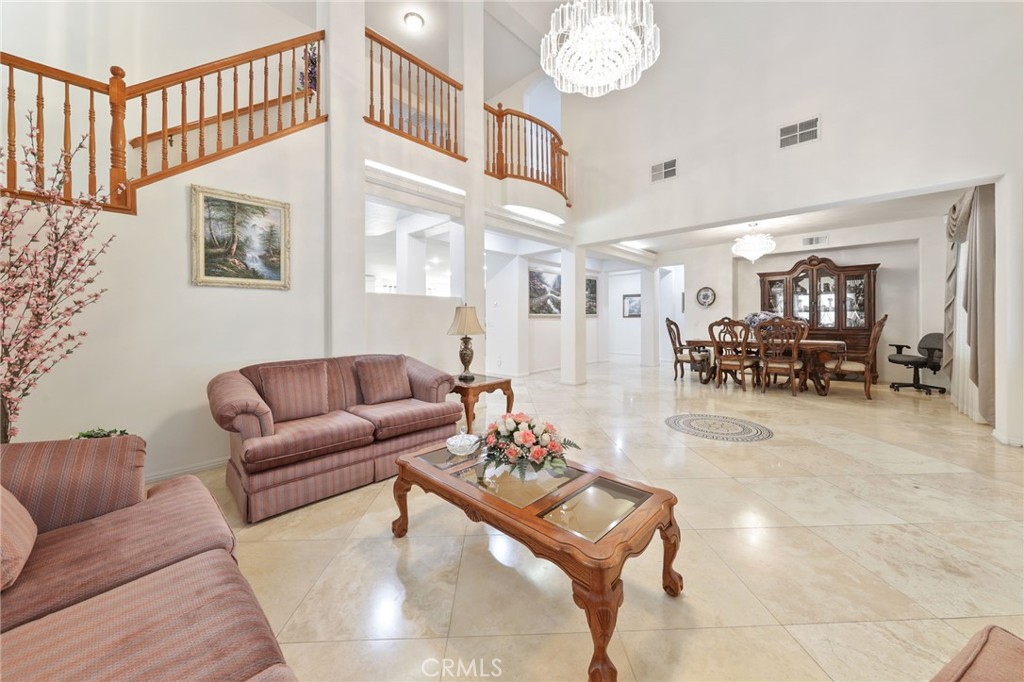 12830 Wildflower Lane Riverside, CA 92503 - Photo 10 of 34 a living room with furniture and a large window