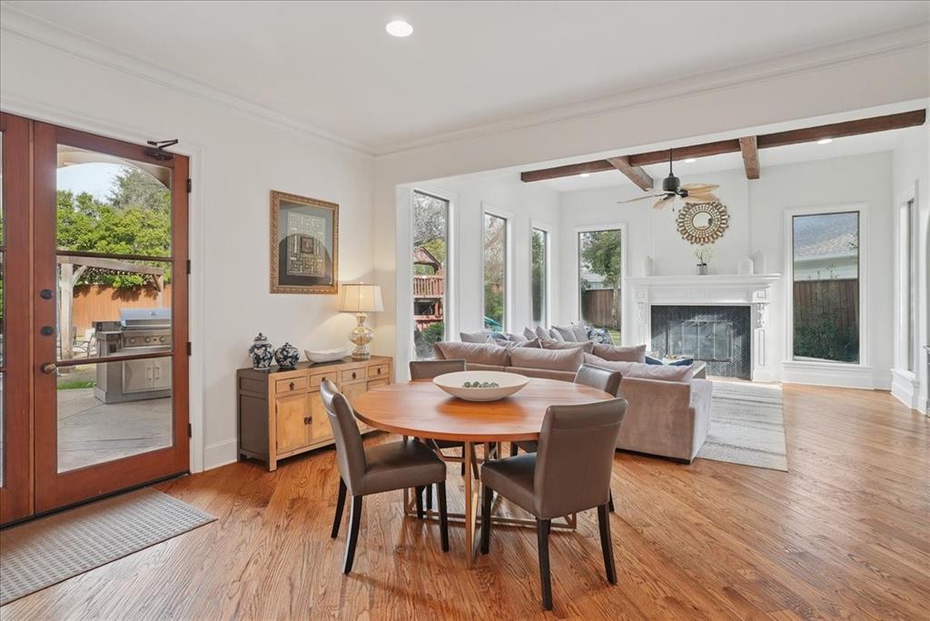 6807 Lupton Drive Dallas, TX 75225 - Photo 13 of 40 a dining room with furniture window and wooden floor