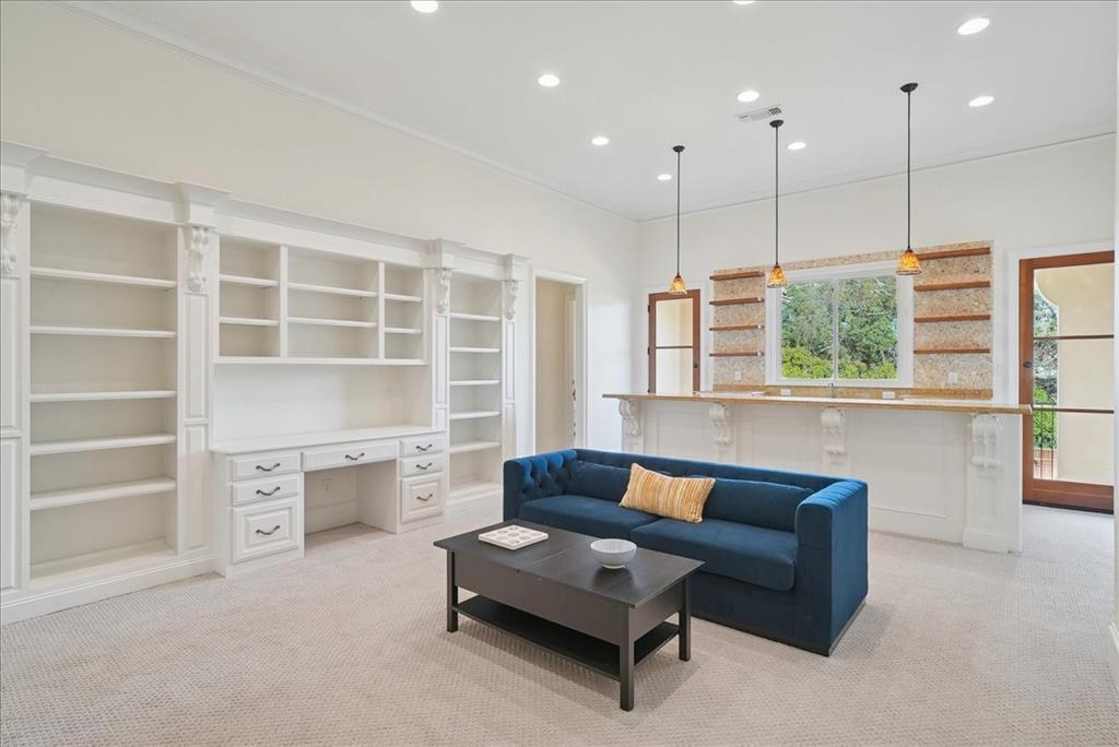 6807 Lupton Drive Dallas, TX 75225 - Photo 21 of 40 a living room with furniture and a large window