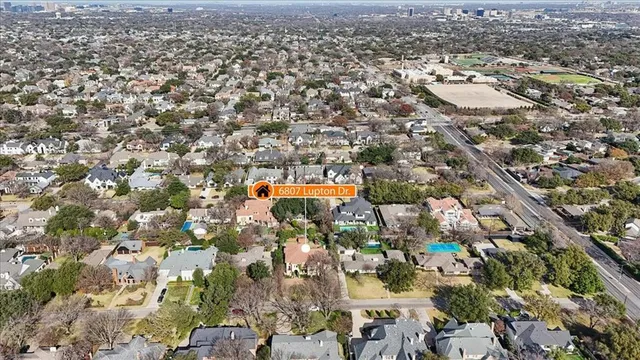 an aerial view of a city with lots of residential buildings