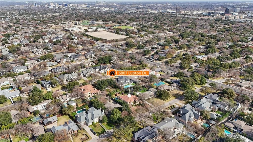 6807 Lupton Drive Dallas, TX 75225 - Photo 40 of 40 an aerial view of residential houses with outdoor space