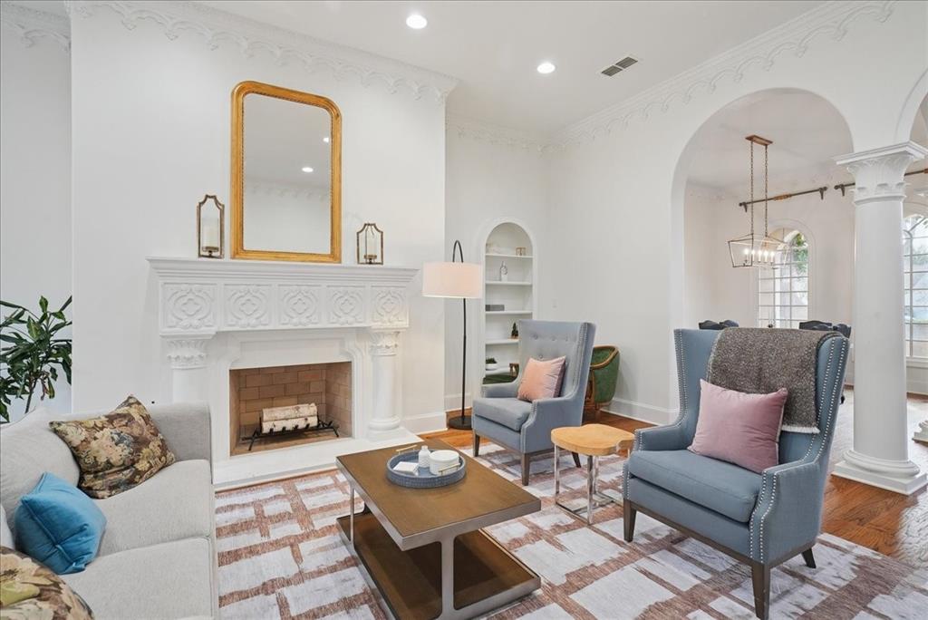 6807 Lupton Drive Dallas, TX 75225 - Photo 7 of 40 a living room with furniture and a fireplace