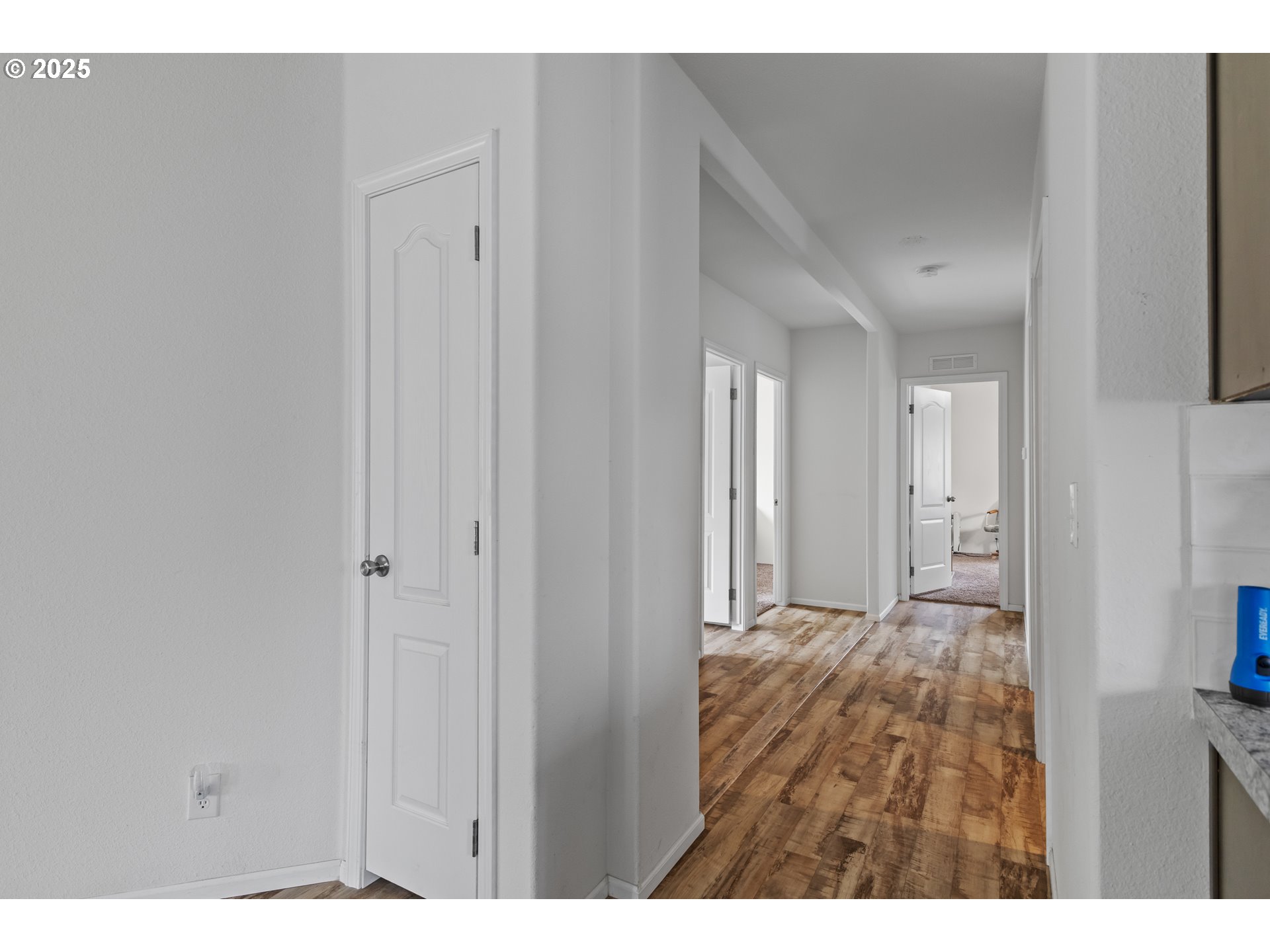 1873 East Cedar Street Myrtle Point, OR 97458 - Photo 24 of 27 a view of an empty room with wooden floor