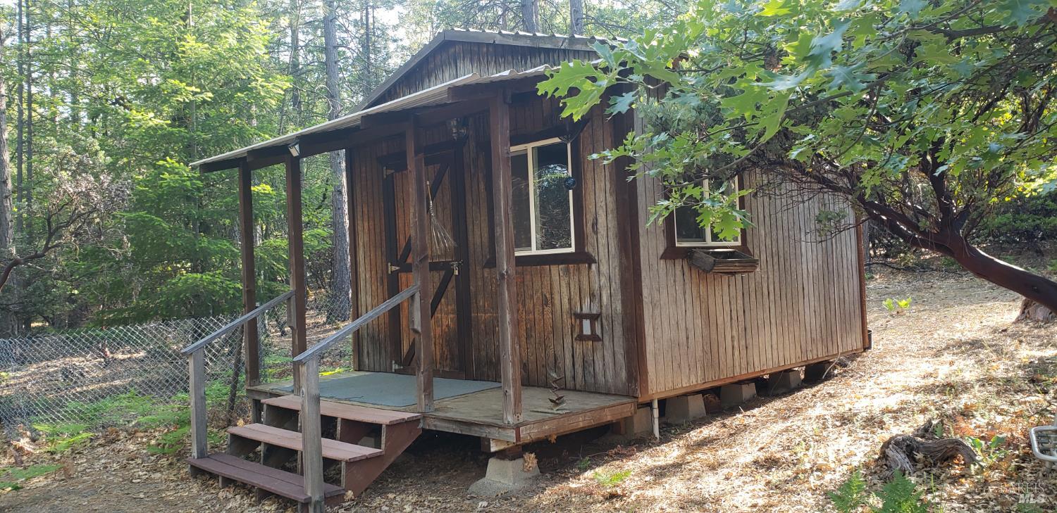 8312 Harrington Flat Road Middletown, CA 95461 - Photo 3 of 19 a view of a house with a yard