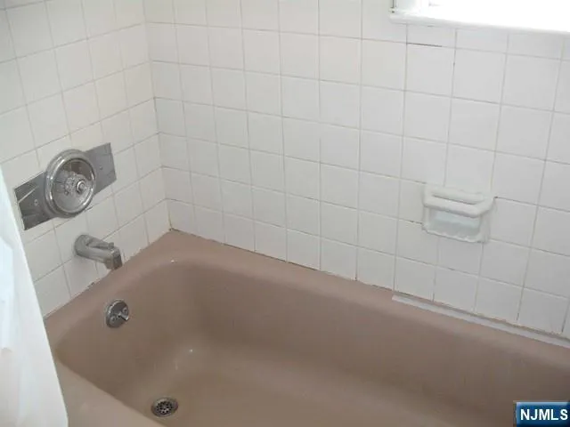a bathroom with a tub