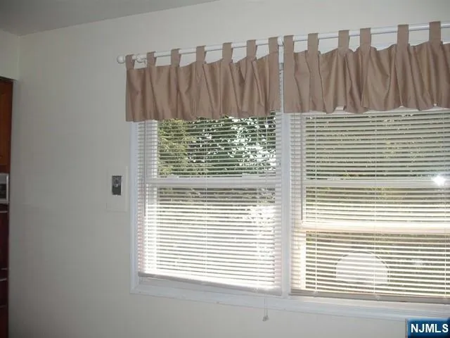 a view of a room with a window