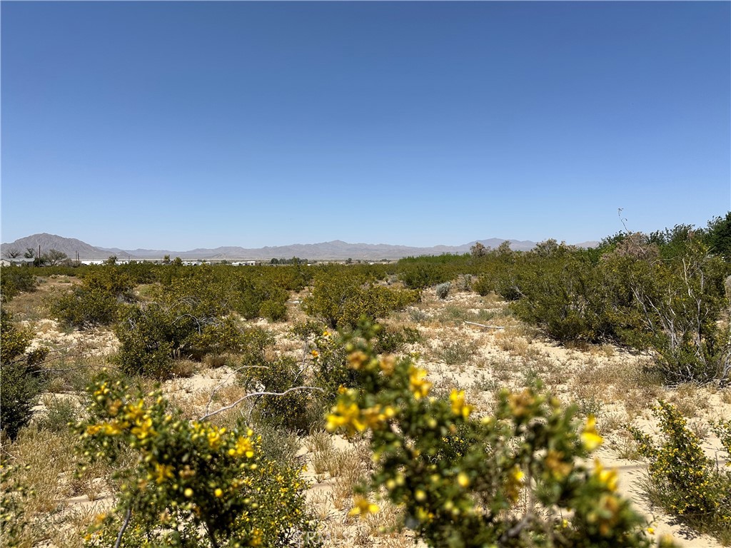 0 Sunset Road Lucerne Valley, CA 92356 - Photo 3 of 16 a view of a city with mountains in the background