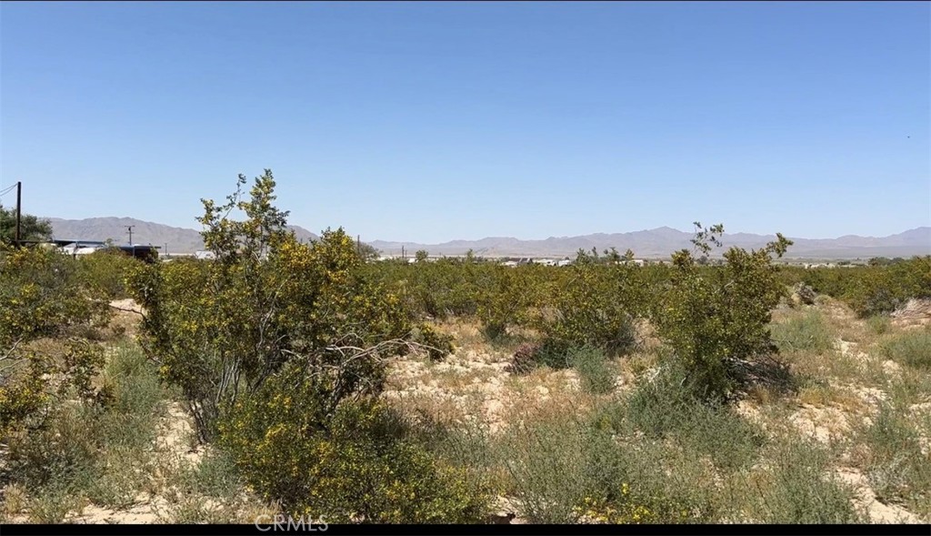 0 Sunset Road Lucerne Valley, CA 92356 - Photo 10 of 16 a view of a city with lush green forest
