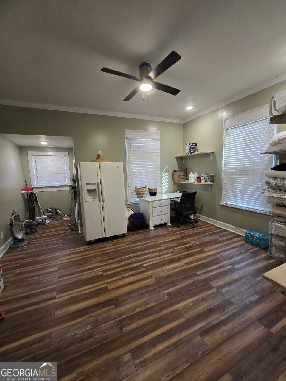 402 Meriwether Street Griffin, GA 30224 - Photo 30 of 38 a living room with furniture and a wooden floor