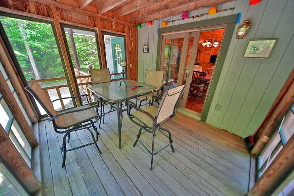323 Sandy Beach Road Danforth, ME 04424 - Photo 79 of 81 screened-in-porch-room-2