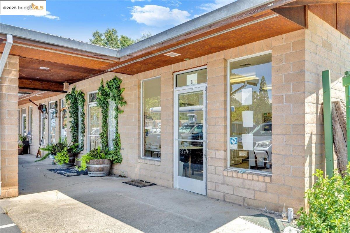 88 Highway 4 Murphys, CA 95247 - Photo 35 of 49 a view of a brick building next to a yard