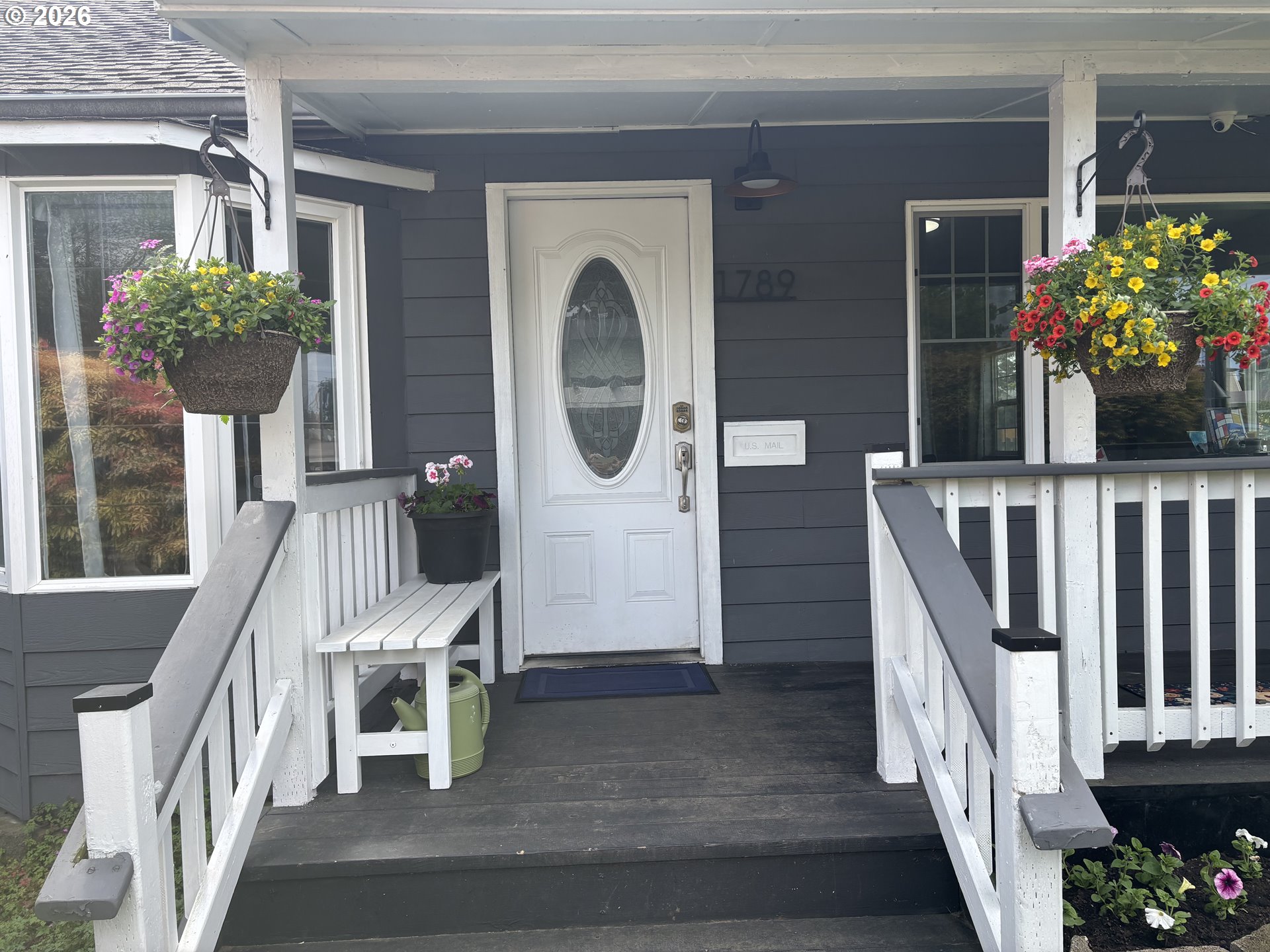 1789 14th Street North Bend, OR 97459 - Photo 2 of 43 a view of entryway with a flower pot and a potted plant