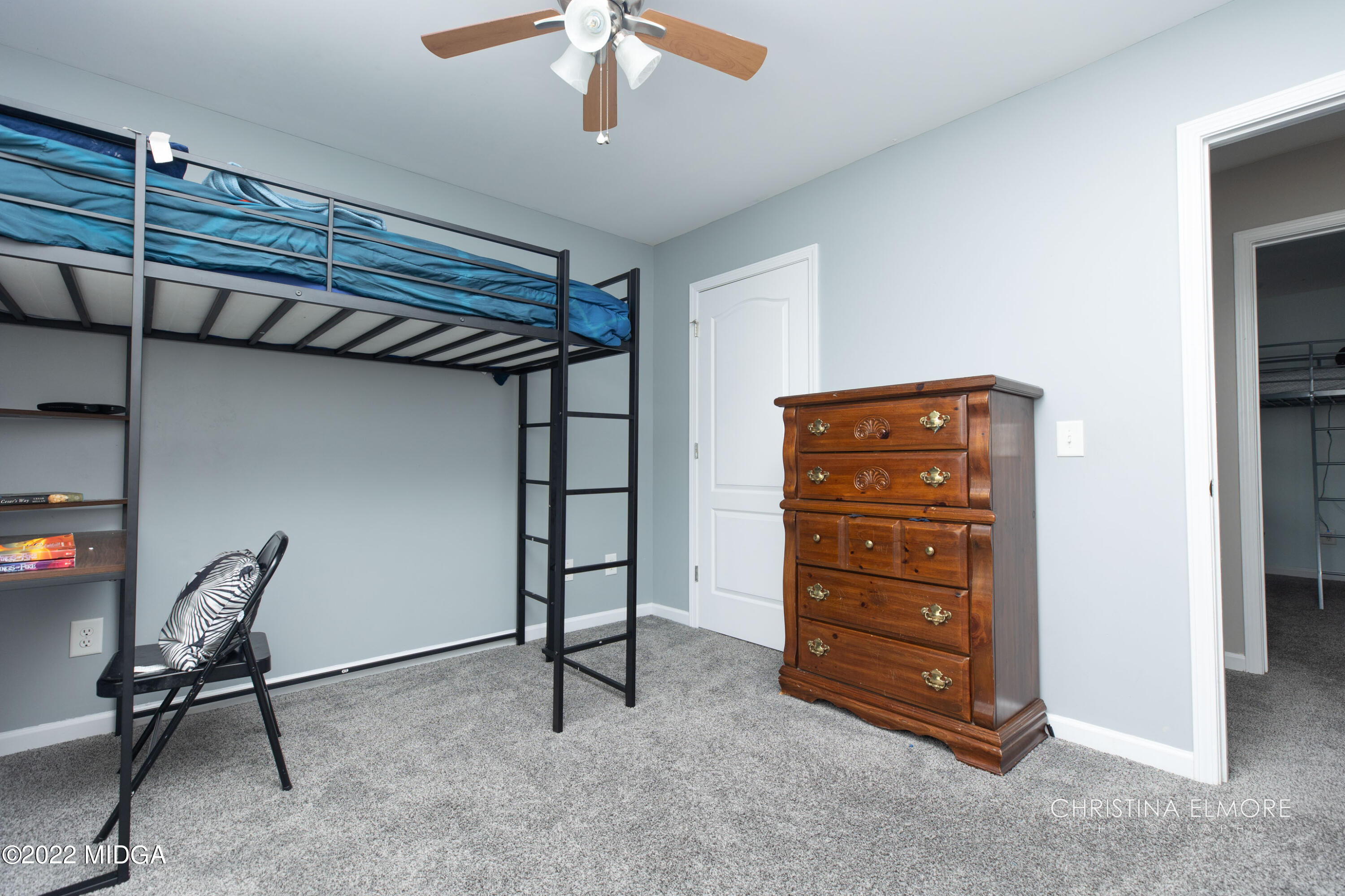 209 McEwen Court Perry, GA 31069 - Photo 35 of 39 a view of room with furniture and a ceiling fan