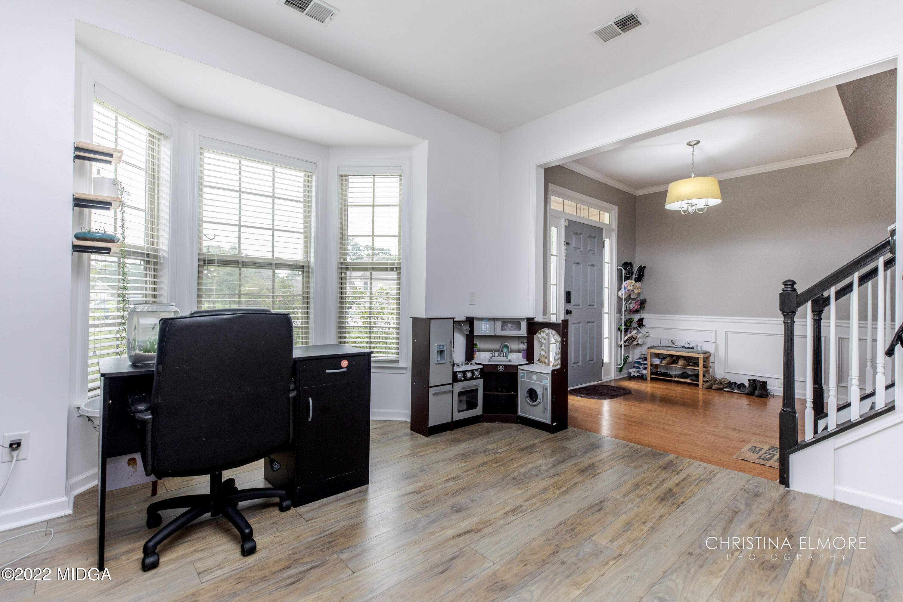 209 McEwen Court Perry, GA 31069 - Photo 7 of 39 a view of a livingroom with furniture and a window