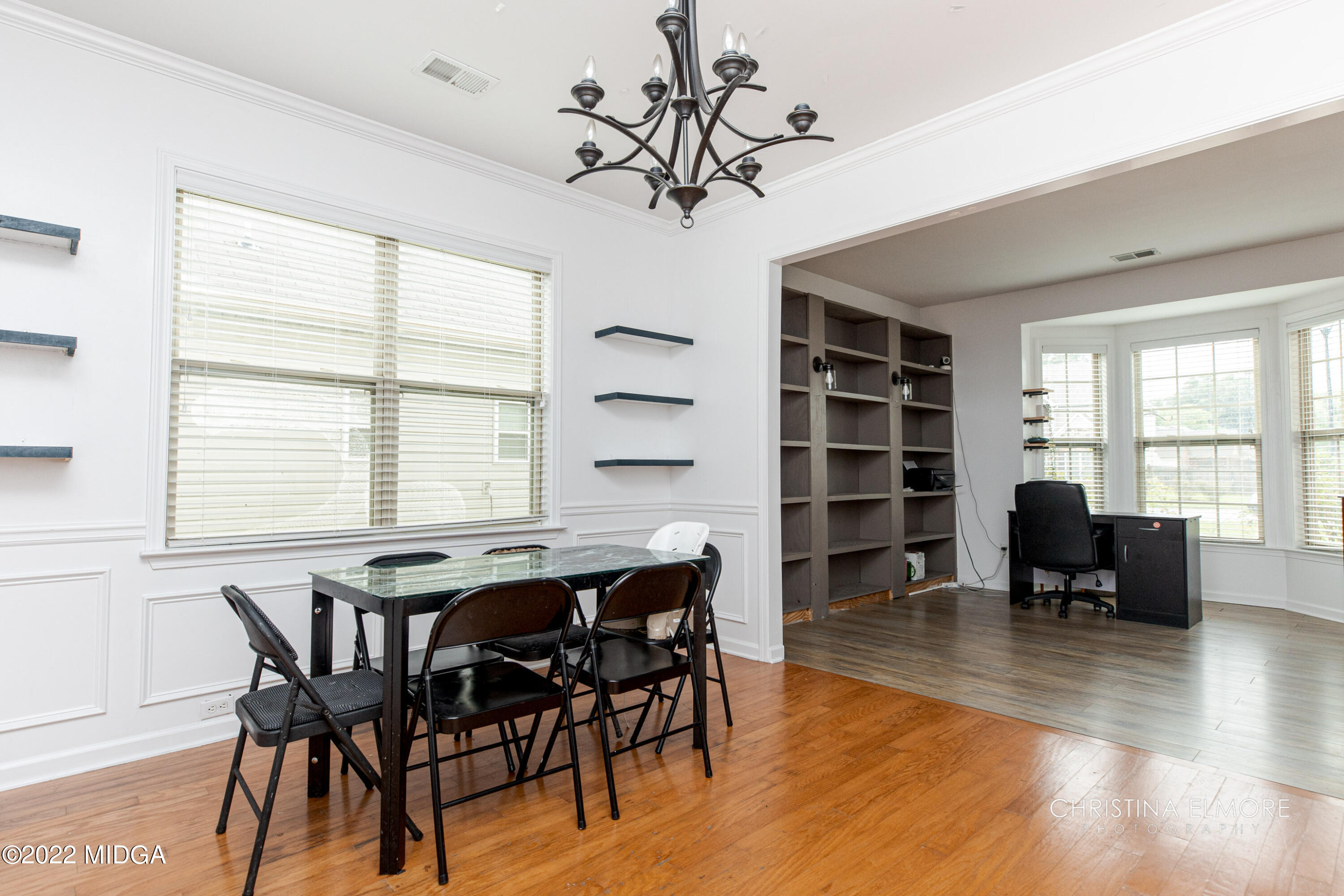 209 McEwen Court Perry, GA 31069 - Photo 9 of 39 a view of a dining room with furniture window and wooden floor