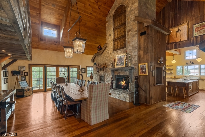 106 Mountain Top Road Glen Gardner, NJ 08826 - Photo 11 of 48 a view of a dining room with furniture and chandelier