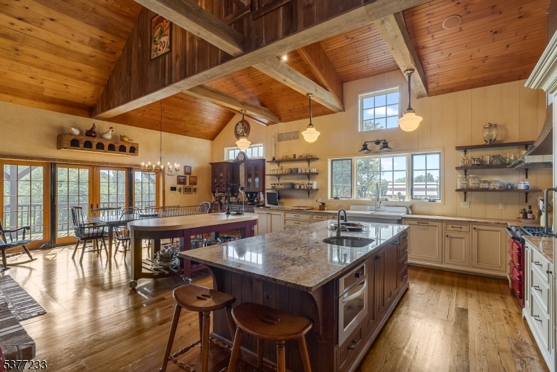106 Mountain Top Road Glen Gardner, NJ 08826 - Photo 17 of 48 a kitchen with stainless steel appliances granite countertop a stove and a wooden cabinets
