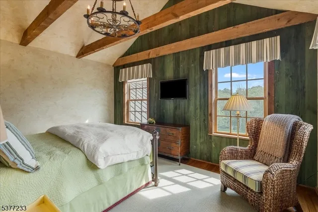 a outdoor space with wooden floor and furniture