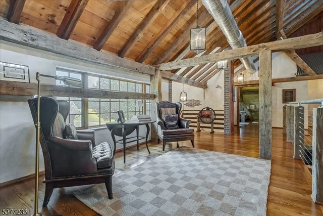 a sign board on the wall of building