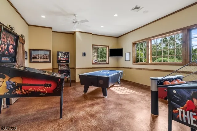 a view of a swimming pool with outdoor seating