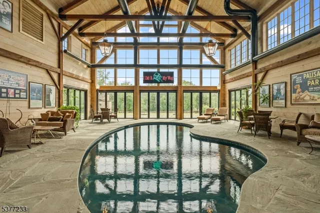 a view of a house with swimming pool